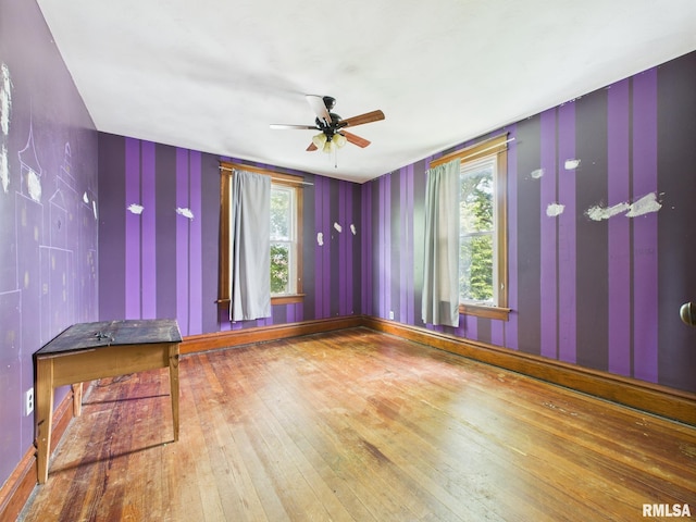 222 N Lewis St, Blue Mound, IL 62513 - empty room featuring ceiling fan and wood finished floors