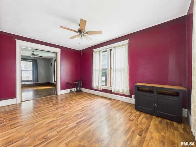 222 N Lewis St, Blue Mound, IL 62513 - unfurnished room featuring ceiling fan and wood finished floors