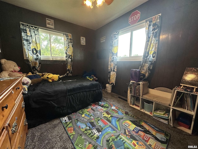 1025 S 15th St, Quincy, IL 62301 - carpeted bedroom with multiple windows and ceiling fan