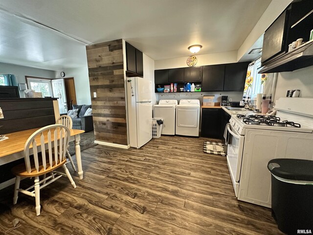 1025 S 15th St, Quincy, IL 62301 - kitchen with white appliances, washing machine and dryer, dark cabinets, open shelves, and dark wood-style flooring