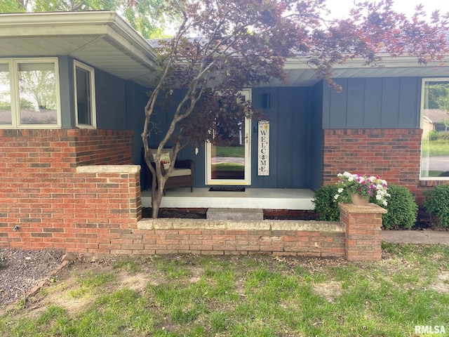 27 Apache Dr, Springfield, IL 62711 - view of side of property featuring board and batten siding and brick siding