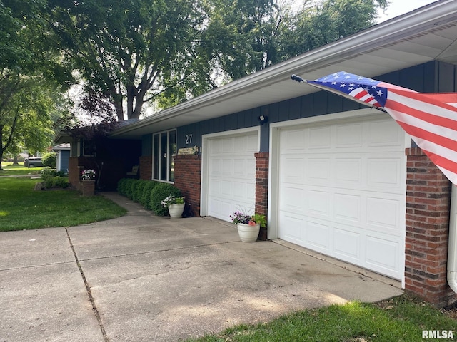 27 Apache Dr, Springfield, IL 62711 - view of home's exterior with brick siding, driveway, and an attached garage