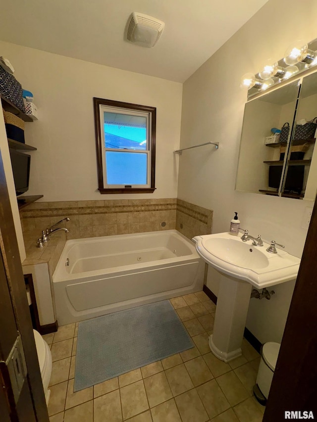 27 Apache Dr, Springfield, IL 62711 - bathroom with tile patterned flooring and a bath