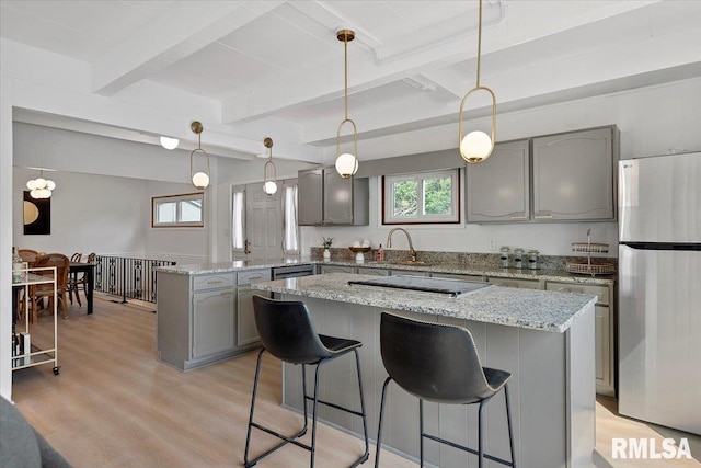 308 Elm Ln, Petersburg, IL 62675 - kitchen featuring stainless steel appliances, gray cabinetry, a peninsula, plenty of natural light, and beamed ceiling