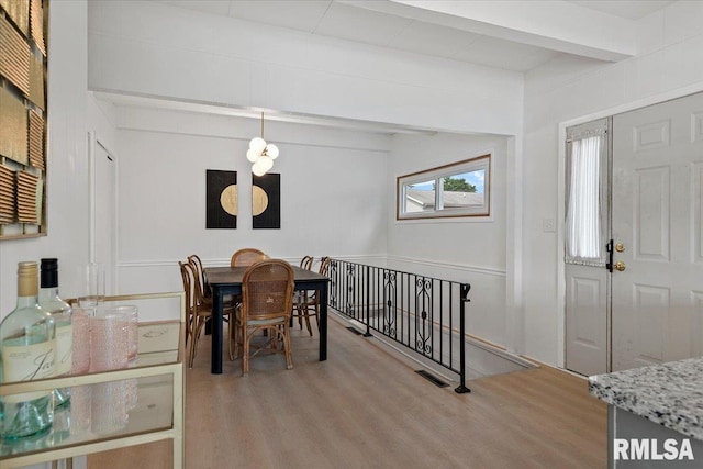 308 Elm Ln, Petersburg, IL 62675 - dining area featuring wood finished floors and beamed ceiling