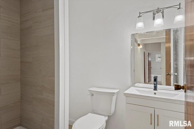 308 Elm Ln, Petersburg, IL 62675 - bathroom featuring toilet and vanity