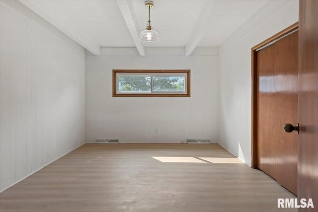 308 Elm Ln, Petersburg, IL 62675 - unfurnished room with light wood-style flooring and beamed ceiling