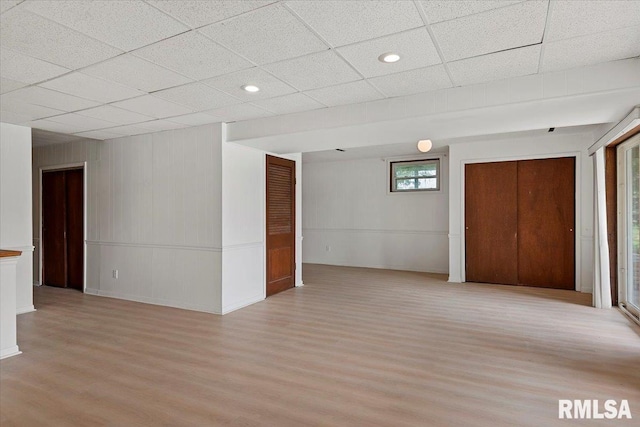308 Elm Ln, Petersburg, IL 62675 - below grade area with light wood-style flooring, a paneled ceiling, and recessed lighting