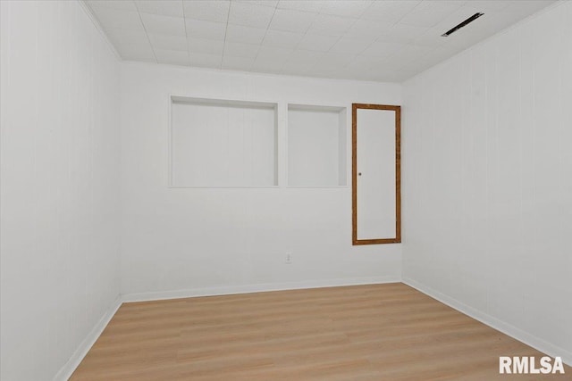 308 Elm Ln, Petersburg, IL 62675 - empty room with light wood-style flooring and crown molding