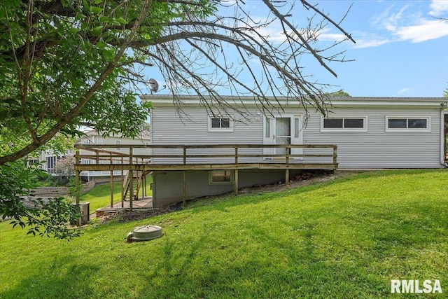 308 Elm Ln, Petersburg, IL 62675 - back of house featuring a deck, a lawn, and stairs