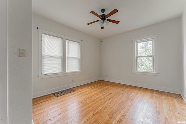 712 N Kickapoo St, Lincoln, IL 62656 - spare room with ceiling fan and hardwood / wood-style flooring