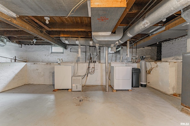 712 N Kickapoo St, Lincoln, IL 62656 - below grade area with washer and dryer and a water softener