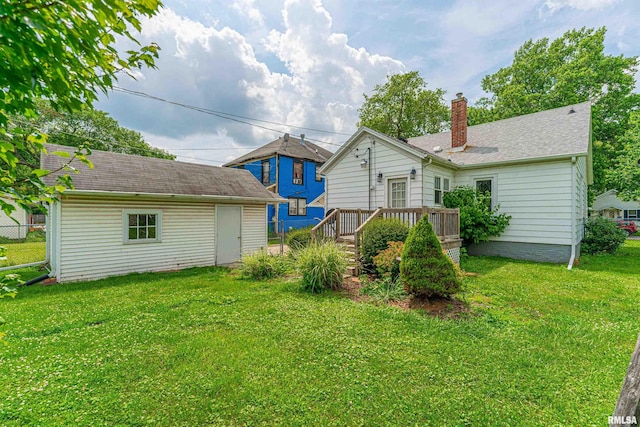 712 N Kickapoo St, Lincoln, IL 62656 - view of yard featuring an outbuilding