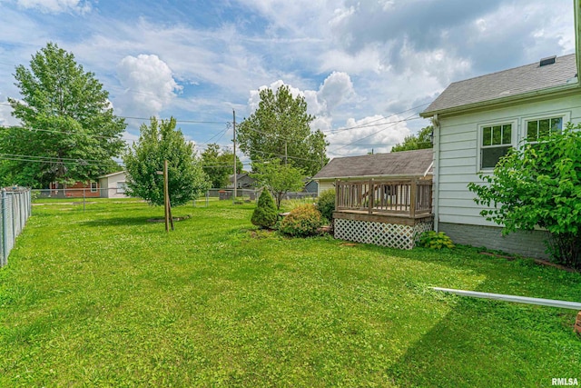 712 N Kickapoo St, Lincoln, IL 62656 - view of yard featuring a wooden deck