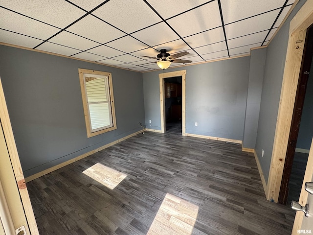 109 Kilgore St, West Point, IL 62380 - unfurnished room with dark wood-style floors, a drop ceiling, and ceiling fan