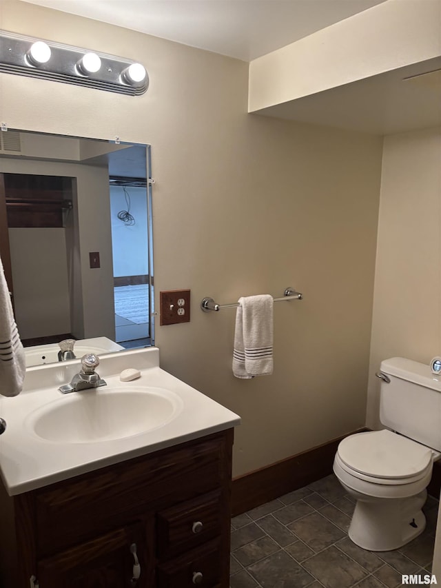 1905 S Whittier Ave, Springfield, IL 62704 - bathroom featuring vanity and toilet