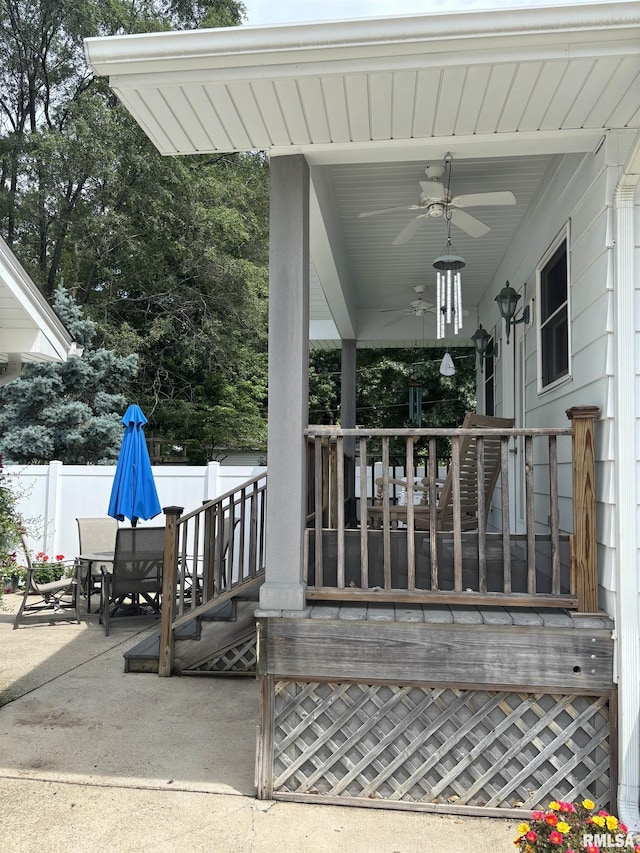1905 S Whittier Ave, Springfield, IL 62704 - porch featuring a ceiling fan, a patio area, and outdoor dining area