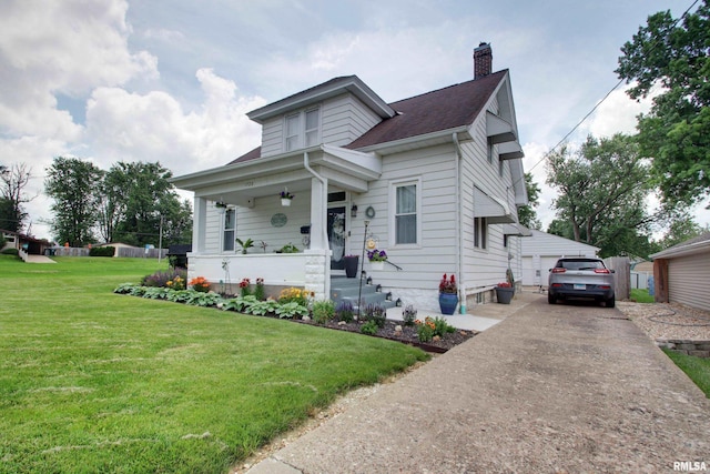 1728 Adams St, Quincy, IL 62301 - view of front of property with a chimney, a porch, a front lawn, a detached garage, and roof with shingles