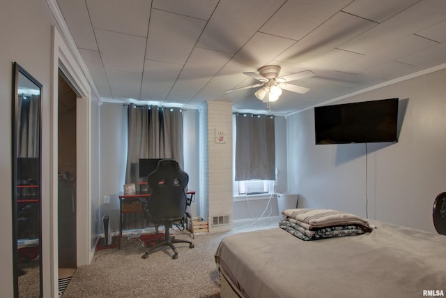 1728 Adams St, Quincy, IL 62301 - carpeted bedroom featuring ornamental molding, an office area, and ceiling fan