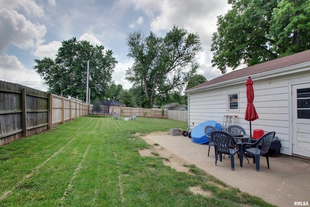 1728 Adams St, Quincy, IL 62301 - fenced backyard with a patio