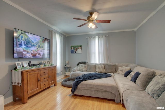 1728 Adams St, Quincy, IL 62301 - living room with light wood-style floors, ceiling fan, and crown molding