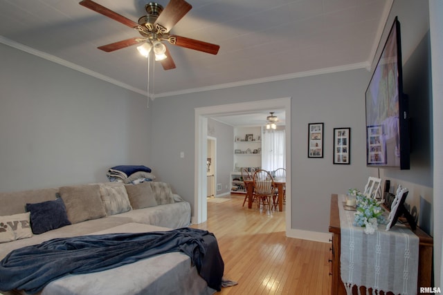 1728 Adams St, Quincy, IL 62301 - bedroom featuring light wood finished floors, crown molding, and a ceiling fan