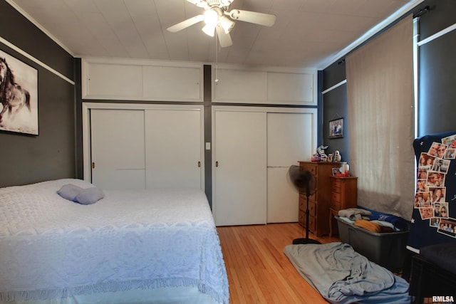 1728 Adams St, Quincy, IL 62301 - bedroom featuring light wood-style flooring and ceiling fan