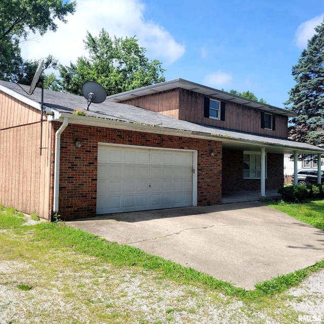 222 E Apple Orchard Rd, Springfield, IL 62703 - view of front of property with a garage, concrete driveway, and brick siding