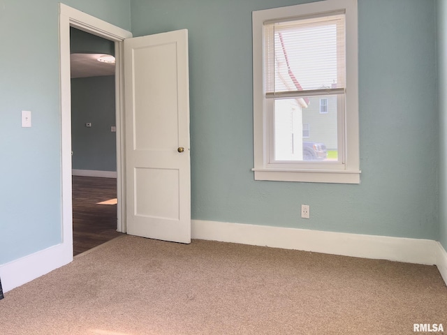 100 N Austin Ave, Abingdon, IL 61410 - spare room with carpet and baseboards