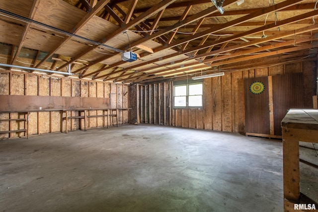 100 N Austin Ave, Abingdon, IL 61410 - miscellaneous room with a garage and unfinished concrete floors