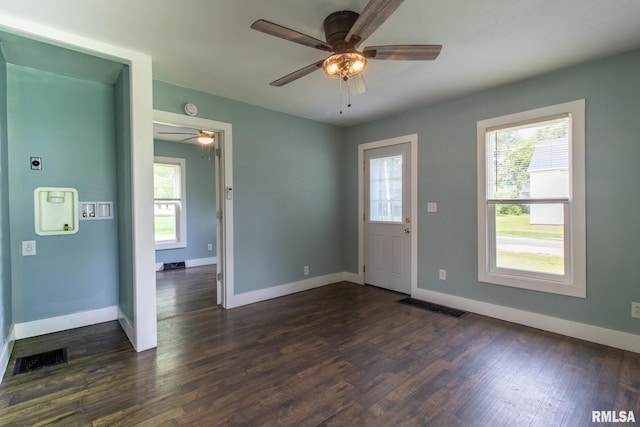 100 N Austin Ave, Abingdon, IL 61410 - foyer entrance with a ceiling fan and dark wood-style floors
