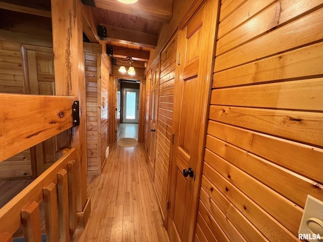 13570 Chambers Rd, Petersburg, IL 62675 - hallway featuring wooden walls, beamed ceiling, and light wood-style flooring