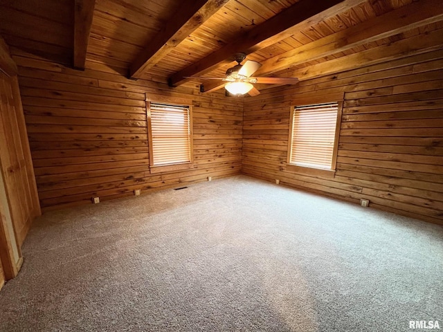 13570 Chambers Rd, Petersburg, IL 62675 - carpeted spare room with a wood ceiling with exposed beams, wood walls, plenty of natural light, and a ceiling fan