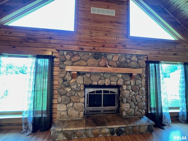 13570 Chambers Rd, Petersburg, IL 62675 - detailed view of wood finished floors, wood walls, and a fireplace