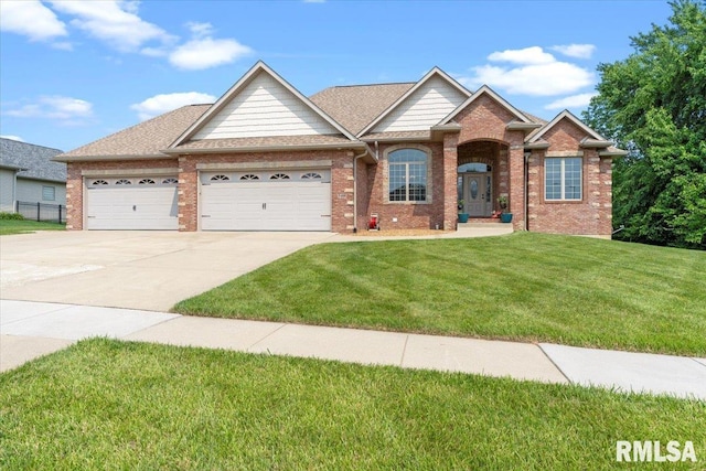 5408 Cromwell Pl, Springfield, IL 62711 - view of front facade featuring a garage, driveway, and brick siding