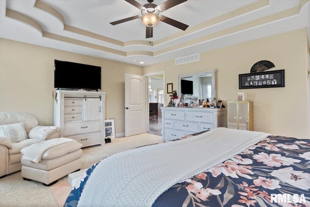 5408 Cromwell Pl, Springfield, IL 62711 - bedroom featuring a tray ceiling, carpet, and a ceiling fan