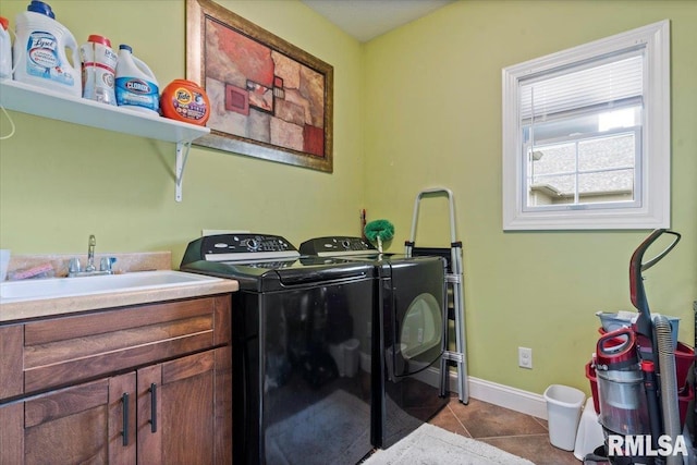 5408 Cromwell Pl, Springfield, IL 62711 - laundry room with washing machine and clothes dryer, cabinet space, and tile patterned floors