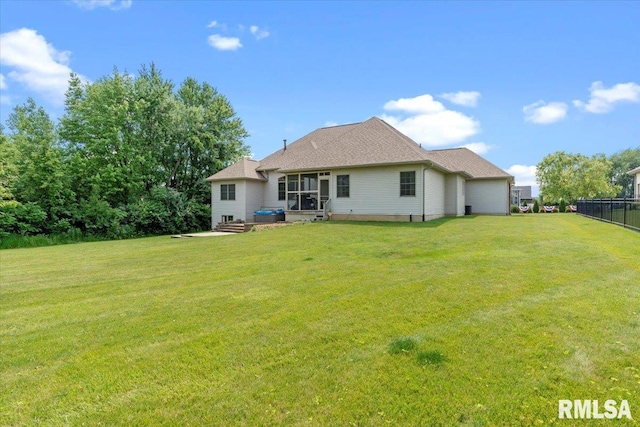 5408 Cromwell Pl, Springfield, IL 62711 - back of property with a garage and a sunroom