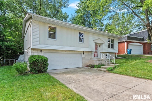 2 Mesa Rd, Springfield, IL 62702 - split foyer home with an attached garage, brick siding, a front yard, and driveway
