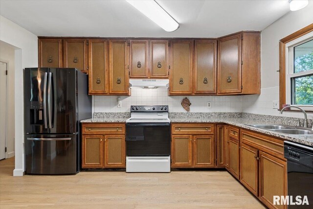 2 Mesa Rd, Springfield, IL 62702 - kitchen with black appliances, under cabinet range hood, light wood finished floors, and decorative backsplash