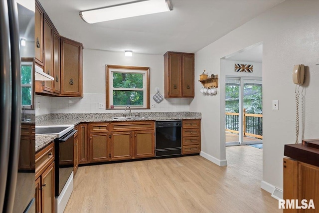 2 Mesa Rd, Springfield, IL 62702 - kitchen featuring black appliances, under cabinet range hood, light wood-style floors, and healthy amount of natural light
