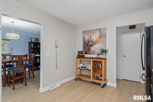 2 Mesa Rd, Springfield, IL 62702 - entrance foyer with light wood-style floors and a chandelier