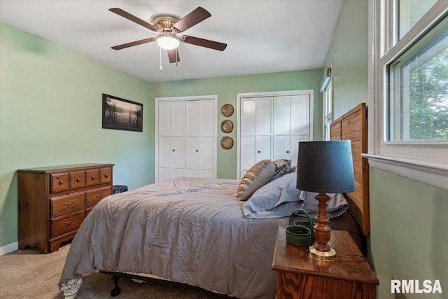 2 Mesa Rd, Springfield, IL 62702 - carpeted bedroom featuring two closets and a ceiling fan