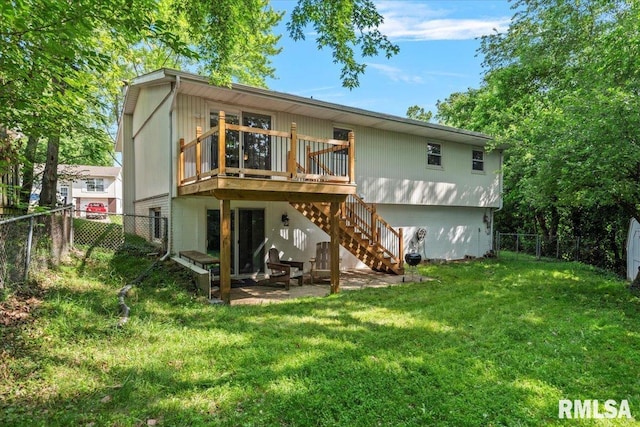 2 Mesa Rd, Springfield, IL 62702 - back of property featuring a fenced backyard, stairway, and a wooden deck