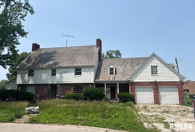 421 W Jackson Pkwy, Springfield, IL 62704 - view of front of home featuring brick siding and a chimney