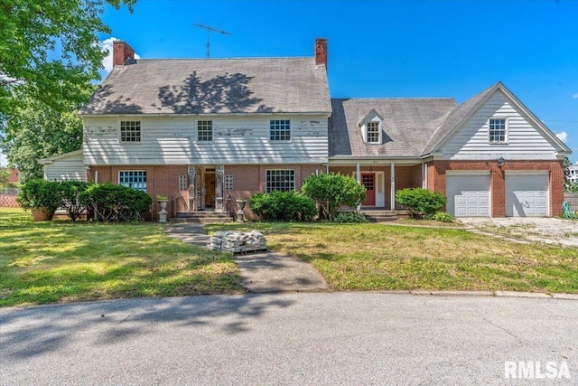421 W Jackson Pkwy, Springfield, IL 62704 - view of front of property with brick siding, a front lawn, and driveway