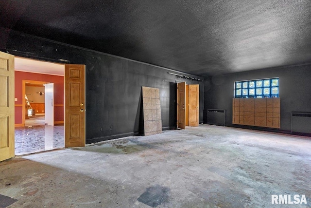 421 W Jackson Pkwy, Springfield, IL 62704 - unfurnished bedroom with unfinished concrete flooring