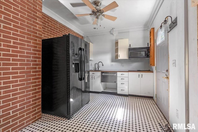 421 W Jackson Pkwy, Springfield, IL 62704 - kitchen featuring black appliances, crown molding, brick wall, light flooring, and a ceiling fan