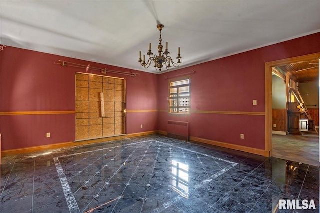 421 W Jackson Pkwy, Springfield, IL 62704 - unfurnished room with a chandelier, wainscoting, and marble finish floors