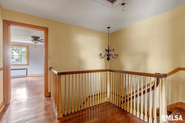421 W Jackson Pkwy, Springfield, IL 62704 - stairway featuring radiator, wood finished floors, and ceiling fan